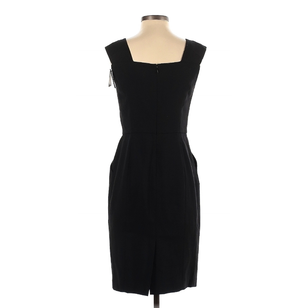 Magaschoni black dress with pockets NWT, size 2